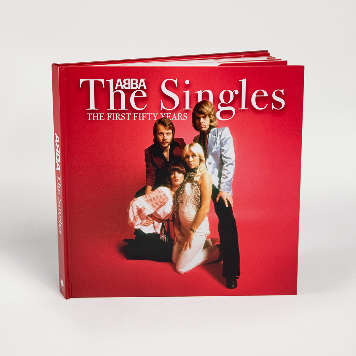 https://images.bravado.de/prod/product-assets/product-asset-data/abba/abba/products/509774/web/488257/image-thumb__488257__3000x3000_original/ABBA_The-Singles-The-First-Fifty-Years_4LP-Abba-Ringer-Tee_s509774_o5336979_a488257_v12302467.f919c640.png